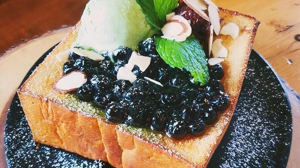 Uji Matcha Lava Toast · Buttery Brick Toast serves with Homemade Red Bean Paste, Toasted Almond, Matcha Ice Cream, Boba and Homemade Uji Matcha Lava Sauce