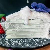 YOUNG COCONUT PANDAN CREPE CAKE (Slice) · Serves with Homemade Young Coconut Sauce.