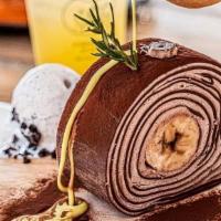 CHOCO BANANA CREPE ROLL (Slice) · A Chocolate crepe Roll is filled with a rich chocolate filling and stuffed with a banana. Dr...
