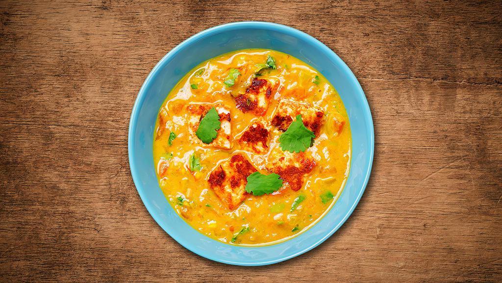 Cottage Cheese Tikka masala · Fresh cottage cheese cubes grilled cooked slowly in a gravy made of tomato and onion and butter added on top.