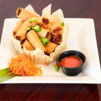 Lumpiang Shanghai (Egg Roll) · A delicious mix of ground pork and vegetables rolled in pastry wrapper and deep fried. Serve...
