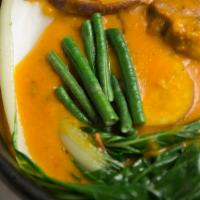 Kare-Kare (Beef Peanut Stew) · Contain nuts, seafood, house specialty. Beef shank and oxtail with vegetables simmered in th...