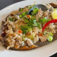 Bangus Sisig  (Sizzling Boneless Marinated Milkfish) · Seafood, dairy. Chopped deep fried boneless milkfish with onions and ginger.