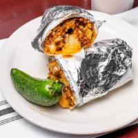 6. Breakfast Burrito · Your choice of chorizo, bacon, ham, or nopales.