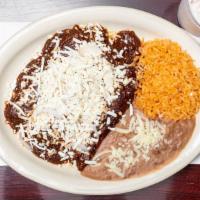23. Enchiladas · Sautéed corn tortillas covered with your choice of red or green sauce, cheese and fresh onio...