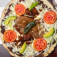 Tlayuda · The most popular dish from Oaxaca, a 12
