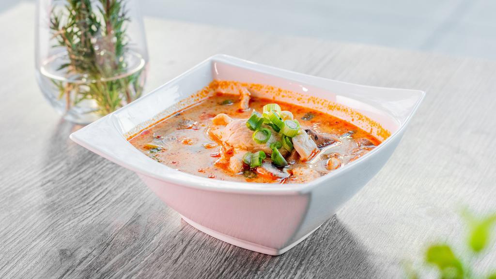 Tom Yum Soup · Hot and Sour soup with Lemongrass, Lime Leaf, Galangal, Thai Style Tom Yum Paste, Chili Oil, Half & Half, Mushroom, Cherry tomatoes, Lime Juice, Green Onion, 
Choice of Shrimp or Organic Soy Tofu