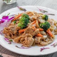 PAD SEE EW CHICKEN  · Fresh Thick Rice Noodle Stir Fry with Egg, Broccoli, Carrot, Chicken and Sweet Black Soybean...