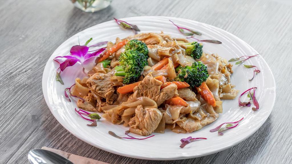 PAD SEE EW CHICKEN  · Fresh Thick Rice Noodle Stir Fry with Egg, Broccoli, Carrot, Chicken and Sweet Black Soybean Sauce