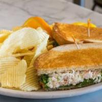 HALF CRAB SALAD SANDWICH & SALAD · Half of our famous crab sandwich with a dinner salad.