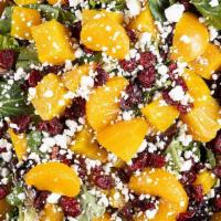 Beet Salad · Red and golden beets with carrot, jicama, corn, and feta over mixed greens with Balsamic.