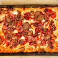 Motown Meat Lover · House-made sausage, pepperoni, meatballs, smoked bacon, ham.