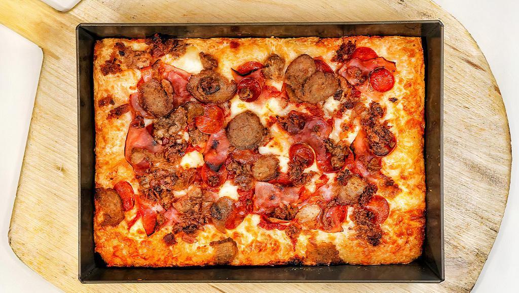 Motown Meat Lover · House-made sausage, pepperoni, meatballs, smoked bacon, ham.