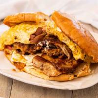 Super Cubana · Mexican sandwich filled with Ham Leg, Sausage, Breaded Steak & Cheese + Additional egg and C...