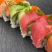 Rainbow Roll · Imitation Crab Meat and Avocado topped with Salmon, Tuna, Ebi