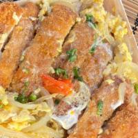 Katsudon · panko breaded chicken cooked in dashi broth with eggs and onions