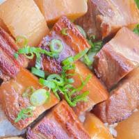 Braised Pork Kakuni (pork belly) · braised pork belly in a sweet and savory sauce served with daikons