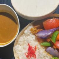 Vegetables · Eggplant, sugar peas, tomatoes with house-made curry sauce.