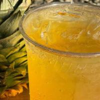 Sunrise Paradise · Pineapple, passion fruit, mango, lemon sparkles.