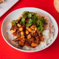 Spicy Kung Pao Chicken Bowl  · Tender chicken that is cooked in a sweet and spicy Sichuan chili-soy sauce, served on jasmin...