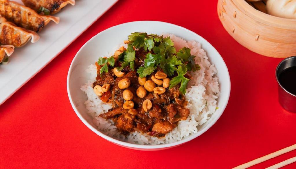 Spicy Kung Pao Chicken Bowl  · Tender chicken that is cooked in a sweet and spicy Sichuan chili-soy sauce, served on jasmine white rice