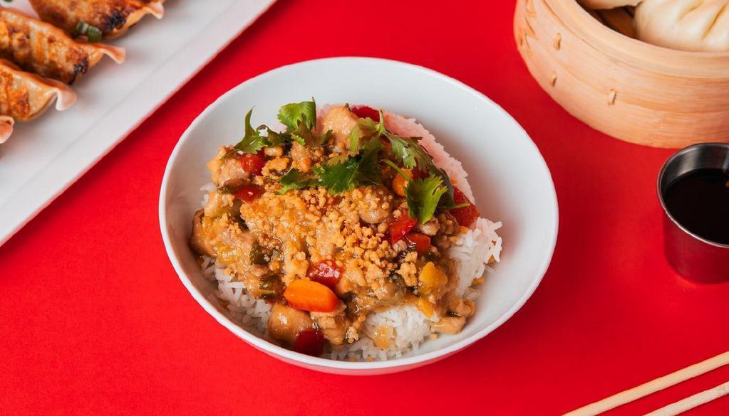 Orange Chicken Bowl  · Chicken in a sweet orange sauce with red peppers and candied orange peel, served on jasmine white rice