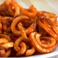 Curly Fries · Curly fries with ketchup