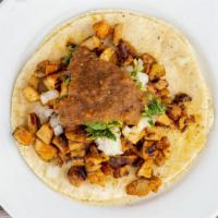 Meat tacos · Served with cilantro, onions, and salsa.
