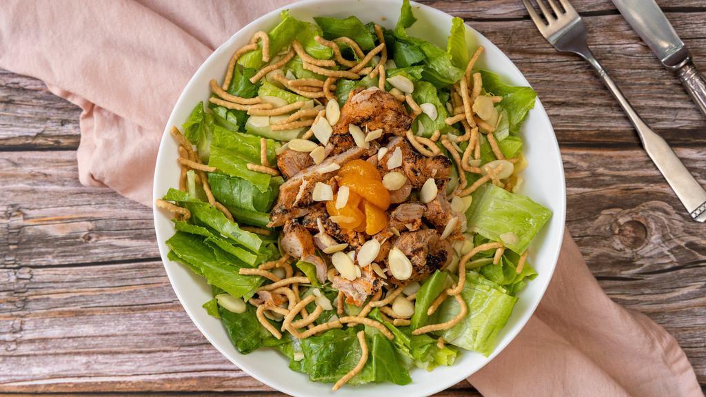 Chinese Chicken Salad · Chicken, crispy Chinese noodles, almonds, Mandarin orange slices, and sesame ginger dressing.