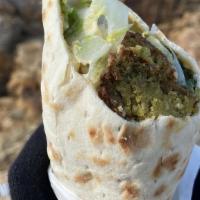 Falafel Wrap · House-made falafel and hummus with lettuce, tomatoes, and tahini sauce. Wrapped with flat br...