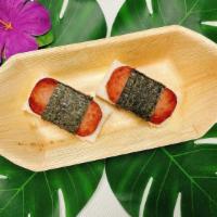 Spam Musubi (2 Pc) · An island classic composed of a slice of grilled spam on rice, wrapped in dried seaweed