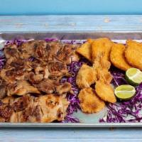 Family Seafood Combo Pack (Serve 6-8) · 12 pcs BBQ chicken, 8 pcs fried fish, 12 pcs fried shrimp, 8 scoops white rice, and 8 scoops...
