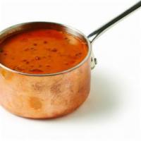 Dal Makhani · Black lentil cooked in onion garlic, ginger, indian spices and butter