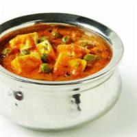 Mutter Paneer or Aloo Mutter · Green peas with cheese or potato cooked with onion, garlic, tomato, ginger and indian spices