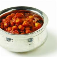 Chana Masala · Garbanzo beans cooked with tomato, onion, ginger, garlic, and authentic Indian
spices