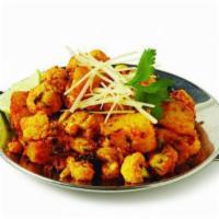 Aloo gobi · Potato, cauliflower, onion, garlic, tomato, ginger and indian spices