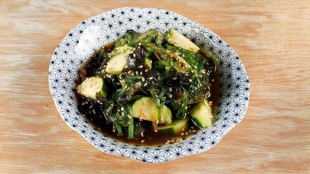 Cucumber Seaweed Salad · Cucumbers + seaweed salad with sesame soy dressing.