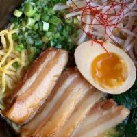 Miso Pork Ramen · Chashu pork belly, spinach, bean sprouts, green onions and half an egg. Rich miso pork broth...