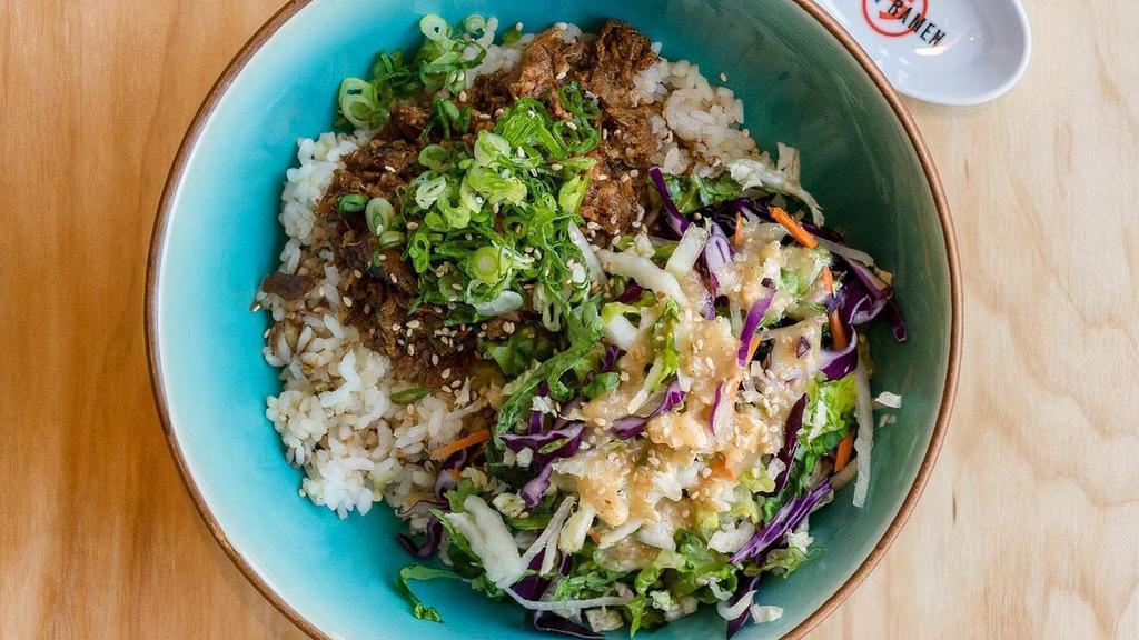 Negi Chashu Donburi · Minced pork belly, green onion, rice, salad with sesame miso dressing and half an egg.