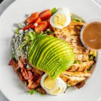 Cobb Salad · Spring mix, chicken, bacon, bleu cheese crumbles, egg, avocado, tomato.