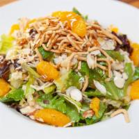 Oriental Chicken Salad · Chicken, lettuce, cabbage, carrots, crispy noodles, toasted almonds, cilantro, mandarins, or...