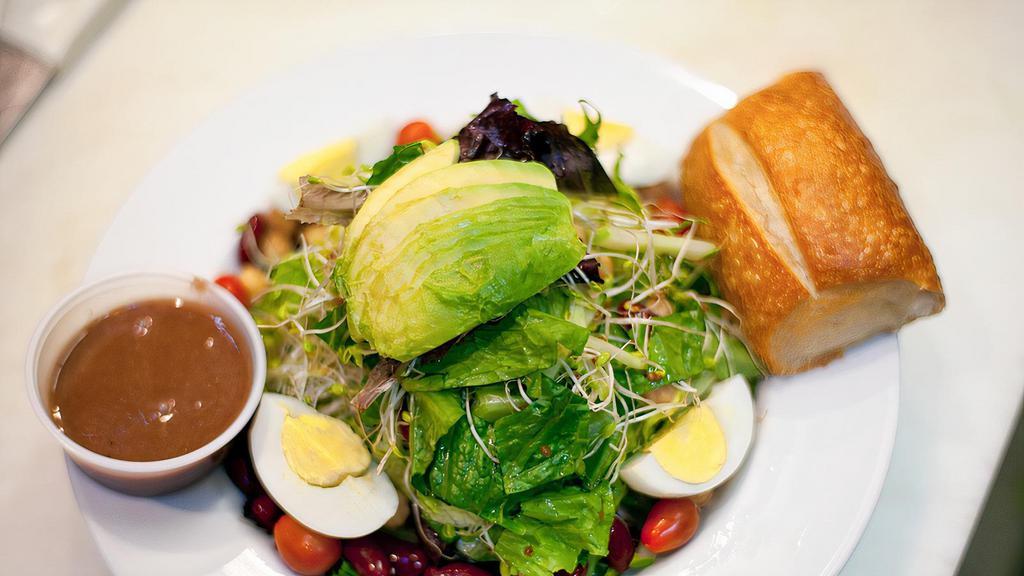 Veggie Delight · Spring mix, tomato, cucumber, sprouts, avocado, egg, kidney and garbanzo beans.
