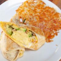 Breakfast Burrito · Flour tortilla filled with scrambled eggs, cheddar, avocado, salsa, sour cream, and choice o...