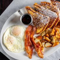 Grind Combo · Two eggs any style, French toast or pancakes, choice of ham, bacon or sausage. Substitute fo...