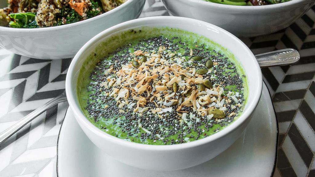 Green Detox Smoothie Bowl · pineapple, spinach, parsley, coconut milk, almond butter, lemon juice, chia seeds topped with toasted coconut, pumpkin seeds, sunflower seeds and bee pollen
