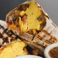 Super Tasty Breakfast Burrito · Burrito filled with chorizo, eggs, peppers, onions, salsa, potatoes, cojita