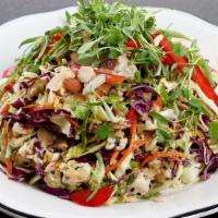 Asian Chicken · Roasted organic chicken, romaine, red and green cabbage, red peppers, and almonds with Asian...