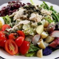 Nicoise · Gluten free. Romaine, tuna, tomatoes, olives, green beans, baby rainbow potatoes and hard-bo...