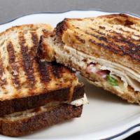 Roasted Diestel Turkey · Turkey, brie, pickled red onion, spinach, and spicy pimento spread on multigrain or sourdough