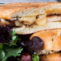 Pollo Sandwich · Marinated boneless chicken breast with caramelized onions, jack cheese and salsa rosa.